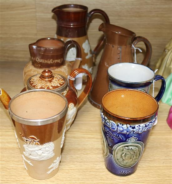 A Doulton Lambeth Victoria commemorative beaker, a similar 1911 Coronation mug and five other items,